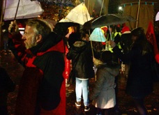 Parade particpants wait for start in the rain.jpg